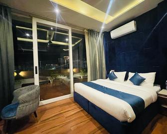 Hotel Ml Pride - Patiala - Slaapkamer