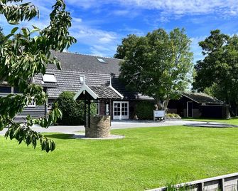 Gastenverblijf Rodenburg - לקרקרק - בניין