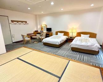 Hotel Taihei Onsen - Kanoya - Schlafzimmer