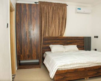 Skenyo Hotel & Apartments - Abuja - Bedroom