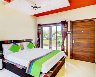 Treebo Garden Cottage & Lawn Mahabaleshwar - Mahabaleshwar - Makuuhuone