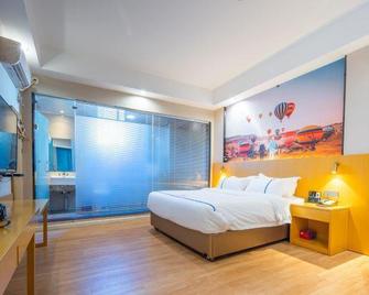 Aegean Art Hotel (Chaozhou People's Square Fortune Center) - Chaozhou - Camera da letto