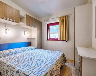 Le Esperidi Camping Ecoresort - Bibbona - Schlafzimmer