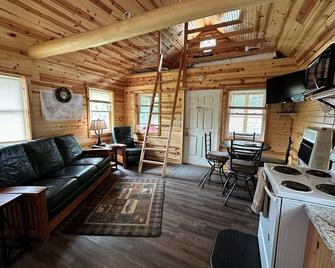 Lakefront Lodging, Beach, Fire Pit, Bar & Grill, Rentals, Live Music, Trails - Tomahawk - Living room