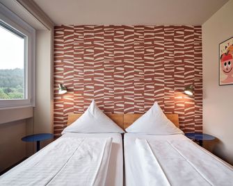 Hokk Hotel Im Sportpark - פרייבורג אים ברייסגאו - חדר שינה