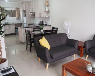 African Eagle Apartments - Benoni - Living room