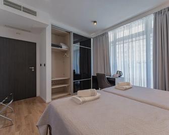 Sky & Sun Luxury Rooms with private parking in the garage - Zadar - Habitación