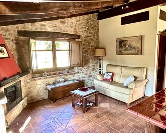 Masia Can Viver - Olive oil tourism B&B - Bigues i Riells - Living room