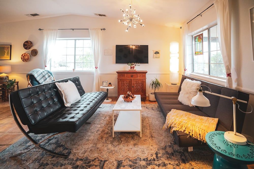 Living room view of Great place to relax after a day exploring Joshua Tree Park. Large kitchen.