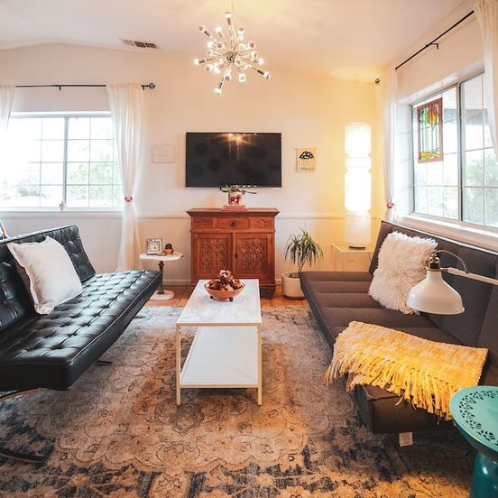 Living room view of Great place to relax after a day exploring Joshua Tree Park. Large kitchen.