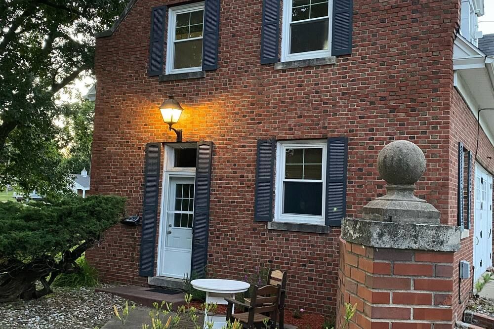 Historic Steckel carriage house with picturesque landscaping