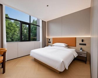Greentree Inn Ningbo Dongqianhu Yinxian Mozhi North Road Business Hotel - Ningbo - Makuuhuone