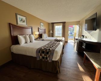 Atkinson Inn & Suites - Lumberton - Schlafzimmer