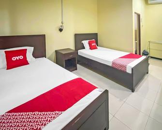 OYO 91946 Hotel Gajah Mada Indah - Купанг - Спальня