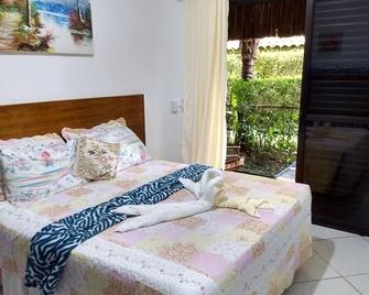 Residencial Caminho do Sol Chalés - Camburi - Quarto