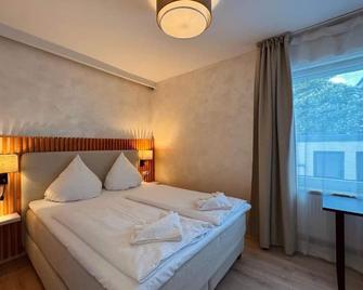 Dingdong Bonn - City Apartments - Bonn - Habitación