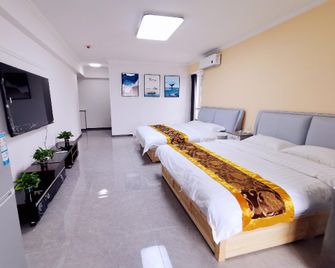 Maple Forest Hotel Apartments (Wanda Oriental Plaza Branch) - Фушунь - Спальня