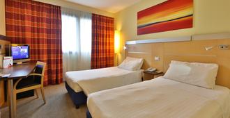 Best Western Palace Inn Hotel - Ferrara - Camera da letto