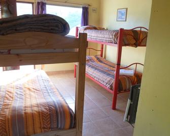 Milenarios Hostel - El Chaltén - Makuuhuone