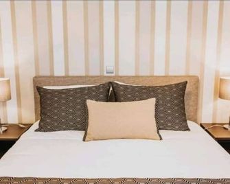 Magnolia Apartment - Geres - Schlafzimmer