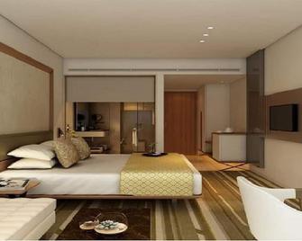 Sayaji Vadodara - ואדודרה - חדר שינה