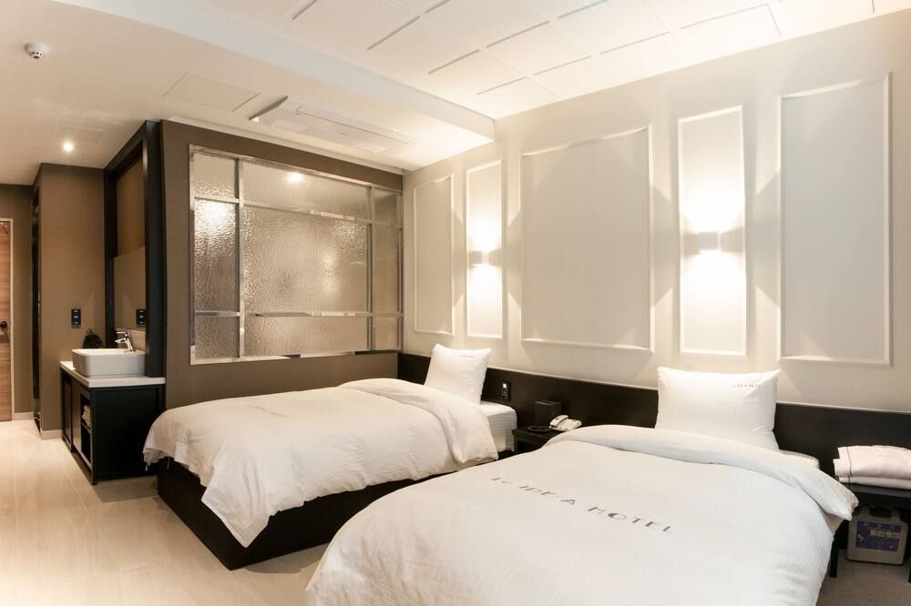 لو أيديا هوتل بوزان ستيشن - بوسان - غرفة نوم