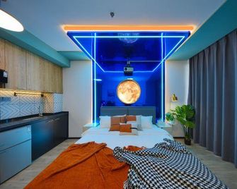 Fengyue Intelligent E-sports Apartment (City Media Plaza) - Qingdao - Habitación