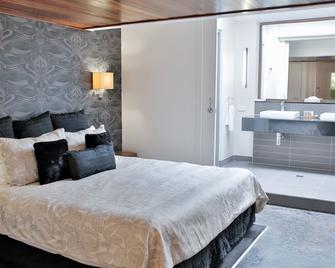 سنترال بارك موتل - روكامبتون - غرفة نوم