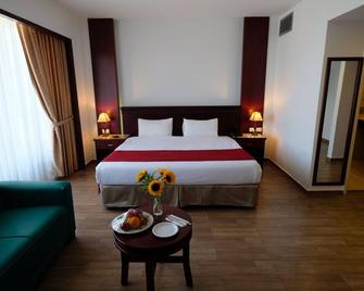 City Inn Palace Hotel - Ramala - Habitación