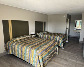 Nola Inn And Suites - ניו אורלינס - חדר שינה