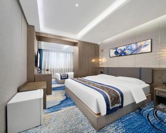 Kailan Hotel (Harbin Central Street Flood Control Memorial Tower) - Harbin - Bedroom