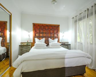 Crater Lakes Rainforest Cottages - Atherton - Спальня