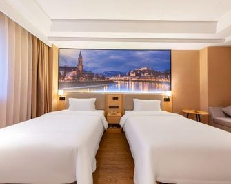 Haolaiwan Hotel - Yunfu - Bedroom