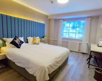 Piao Home Inn (Beijing West Railway Station) - Pekín - Habitación