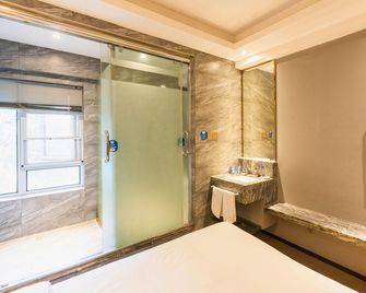 Trendy Esports Business Hotel (Nanjing South Railway Station Branch) - Ναντσίνγκ - Κρεβατοκάμαρα