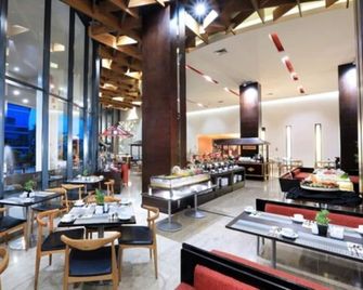 Aston Palembang Hotel & Conference Center - Palembang - Restaurante