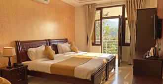 Hotel Nirvana Palace - Rishikesh - Kamar Tidur