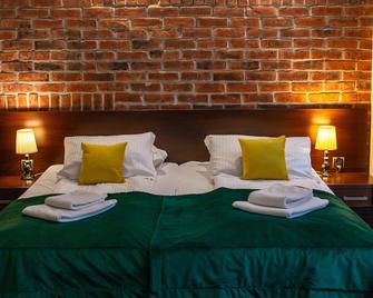 هوتل أرتوس - غدانسك - غرفة نوم