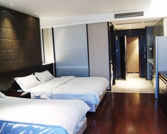 Nanjing Kaibin Apartment-Xinjiekou Kairun Branch - Nanjing - Schlafzimmer