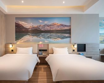 Xingyue Hotel (Xuzhou Suning Plaza Railway Station Branch) - Xuzhou - Bedroom