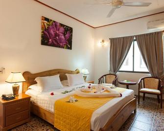 Orchid Self Catering Apartment - La Digue Island - Chambre