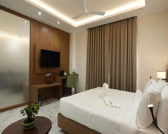 Hotel The Avoir Asansol - Āsansol - Bedroom