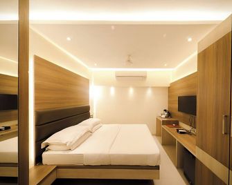 Hotel Shivam - פון - חדר שינה