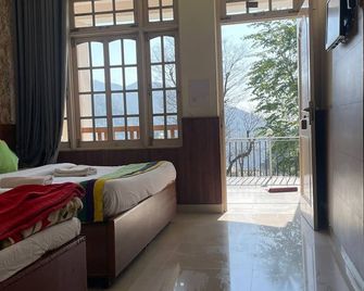 هوتل سكاي بي - دهارامشالا - غرفة نوم