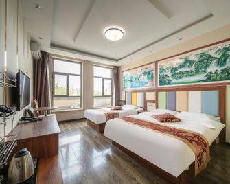 Harbin Xiangshuwan Hotel (Sun Island) - هاربين - غرفة نوم