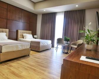 Portik Hotel - Berat - Schlafzimmer