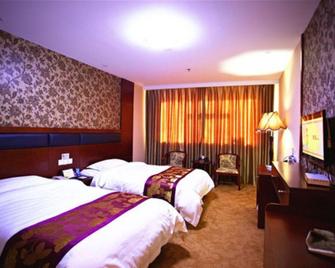 City Garden Hotel Fuxin Jiefang Main Street - Fuxin - Bedroom