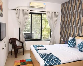 Tulsi Home Stay - Mumbai - Camera da letto