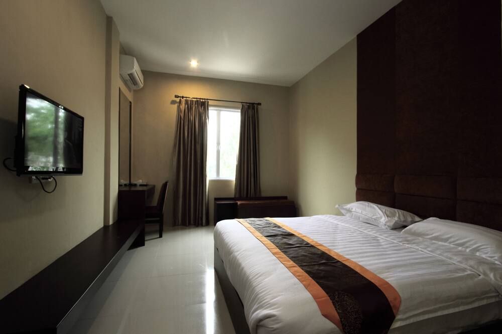 Nagoya One Hotel - באטאם קוטה - חדר שינה