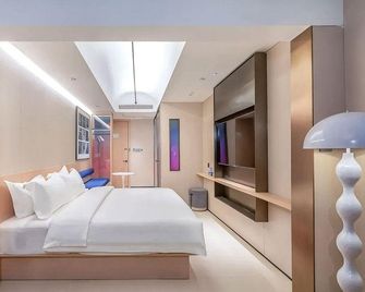 Nanyang Weshang Select Hotel (Jianshe West Road Railway Station Branch) - Nanyang - Bedroom